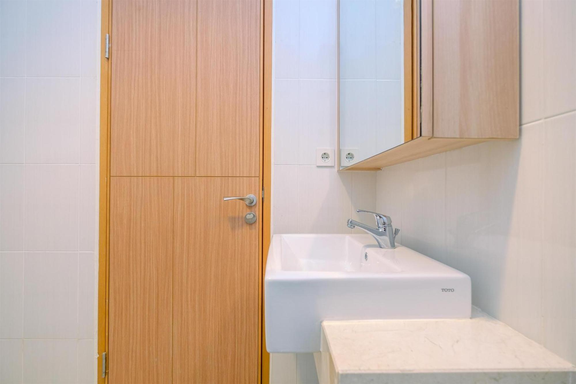 Modern And New 1br Across Lrt Station Samara By Travelio Apartment Jakarta