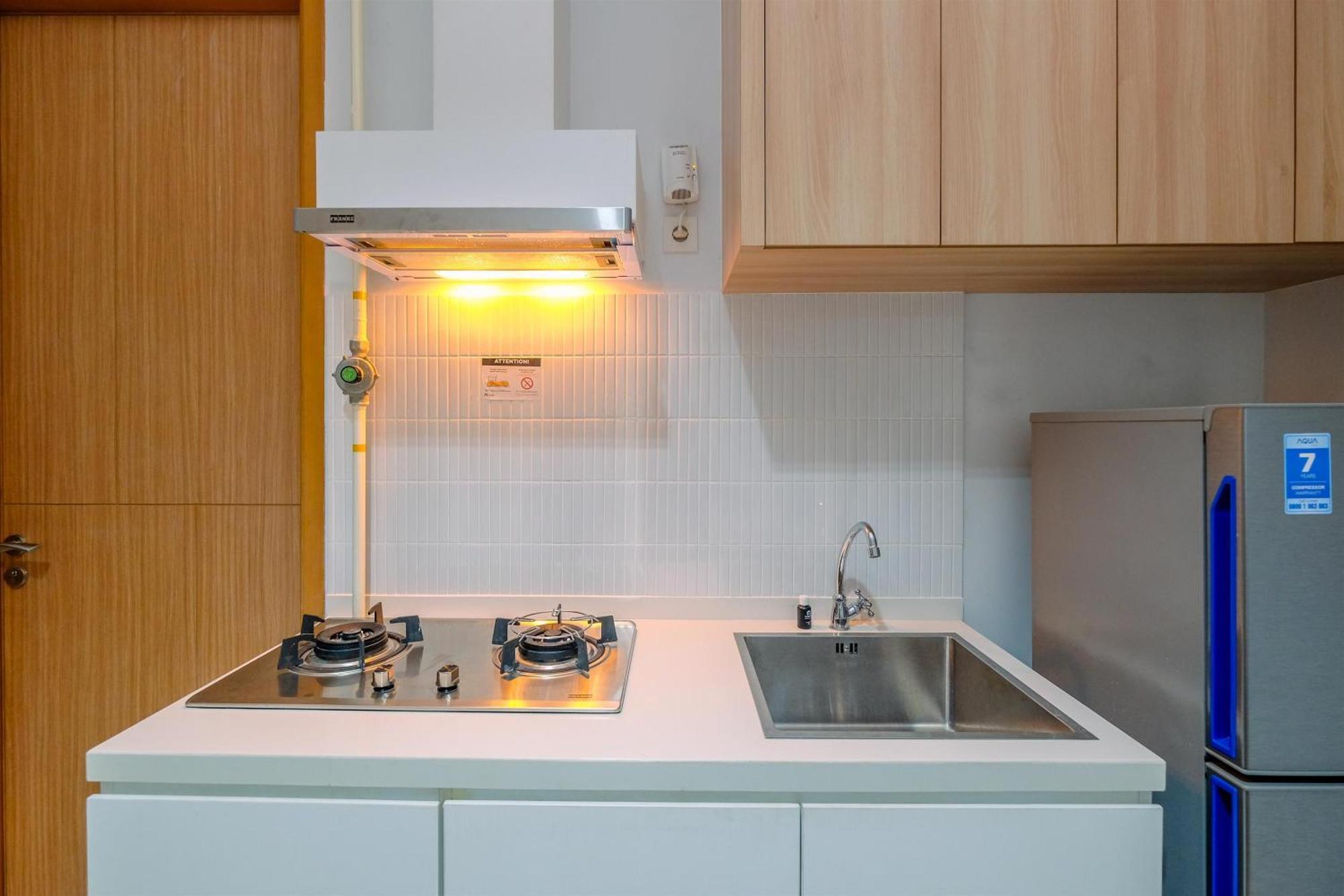 Modern And New 1br Across Lrt Station Samara By Travelio