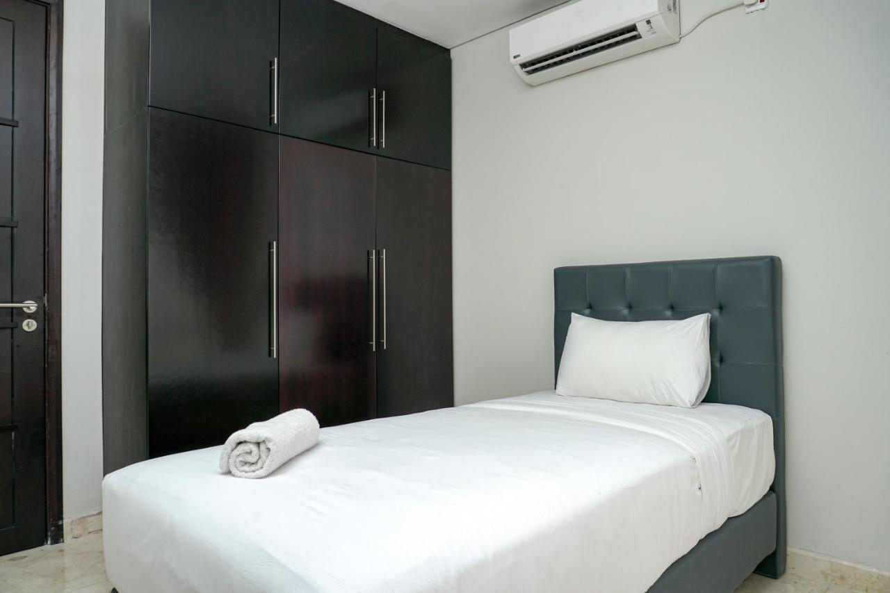 Apartment Cozy 2br @ The Masterpiece Epicentrum By Travelio