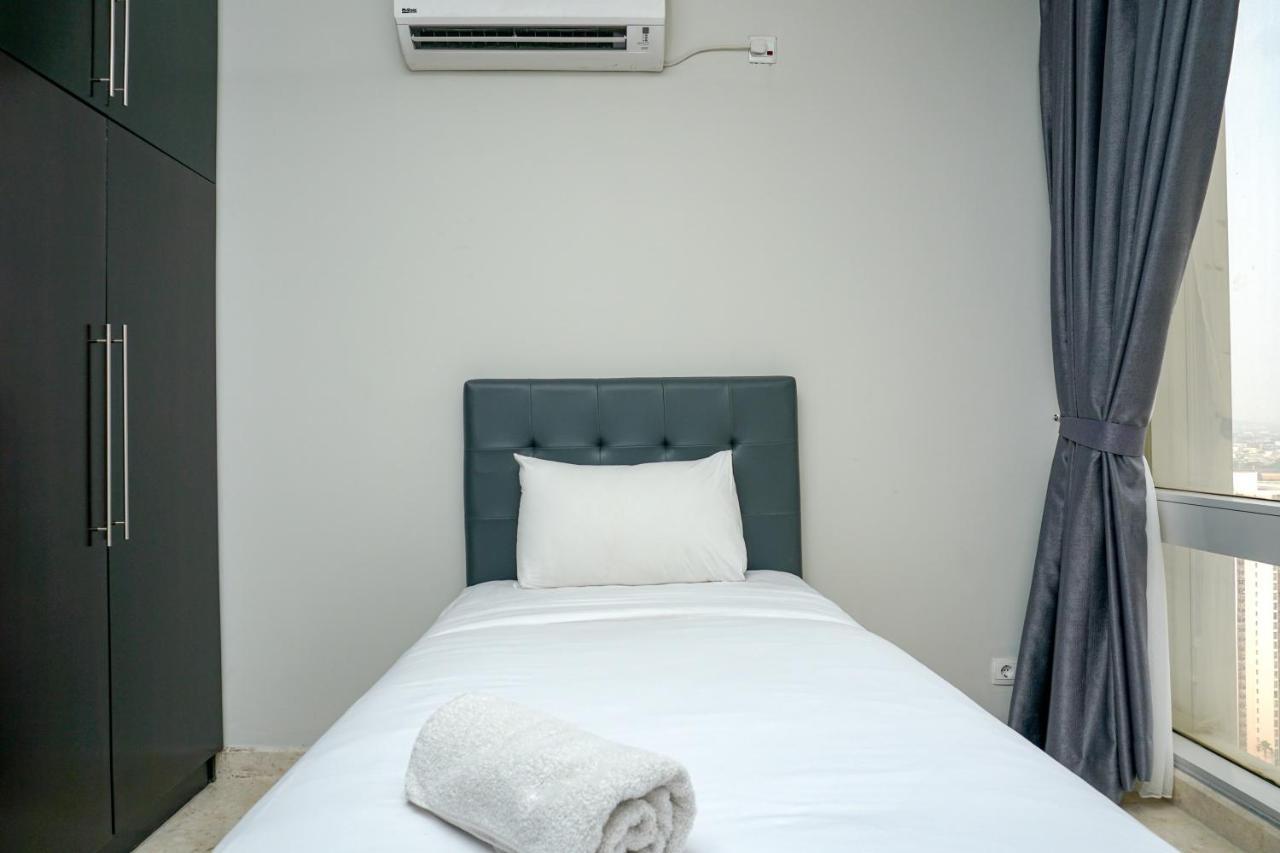 Cozy 2br @ The Masterpiece Epicentrum By Travelio *