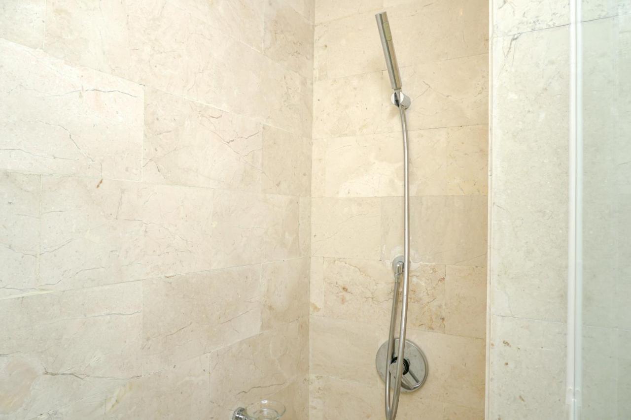 Cozy 2br @ The Masterpiece Epicentrum By Travelio *