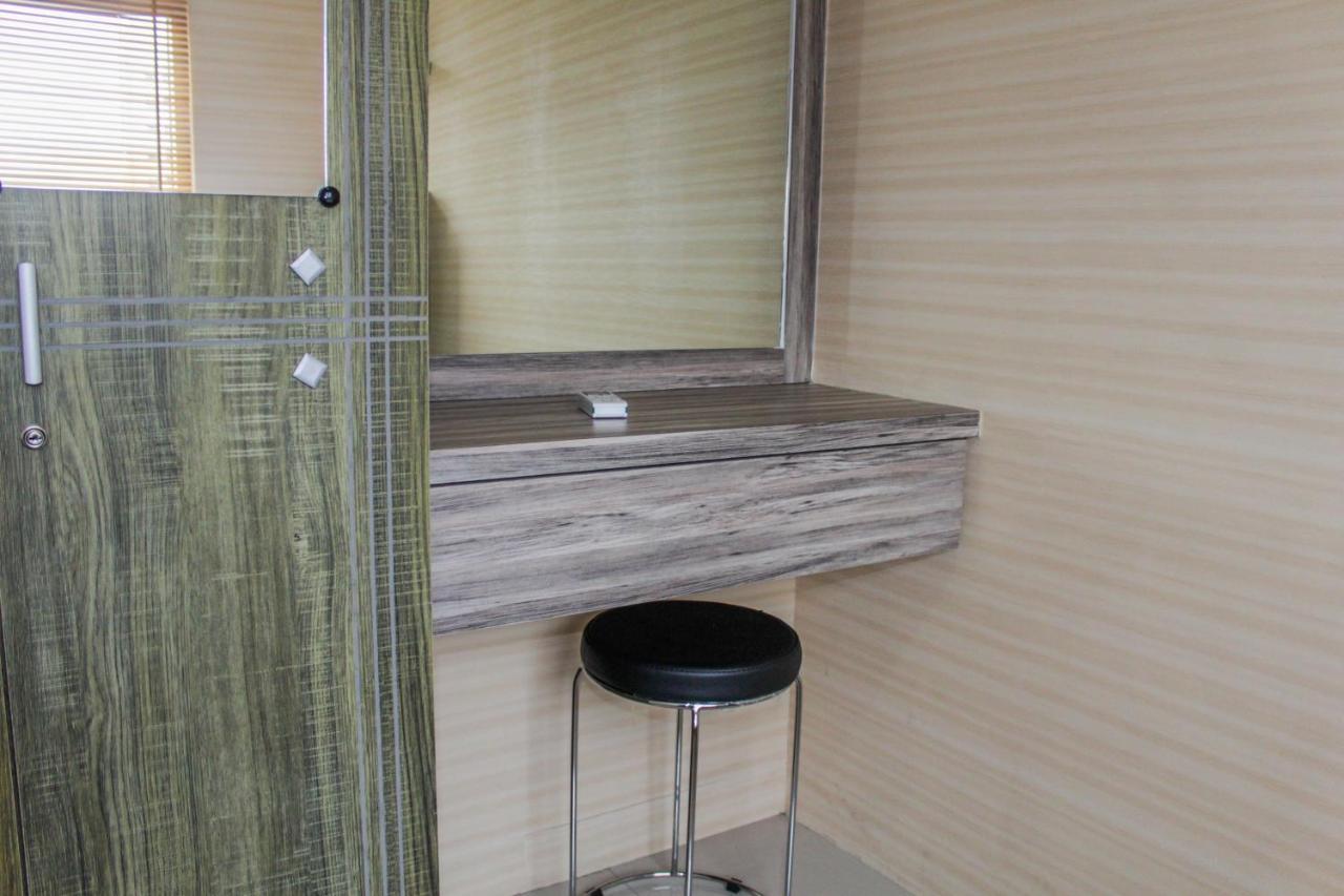 Minimalist 2br Pramuka Near Shopping Mall By Travelio *