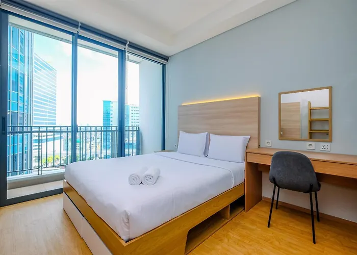 Modern And New 1Br Across Lrt Station Samara Suites Apartment By Travelio