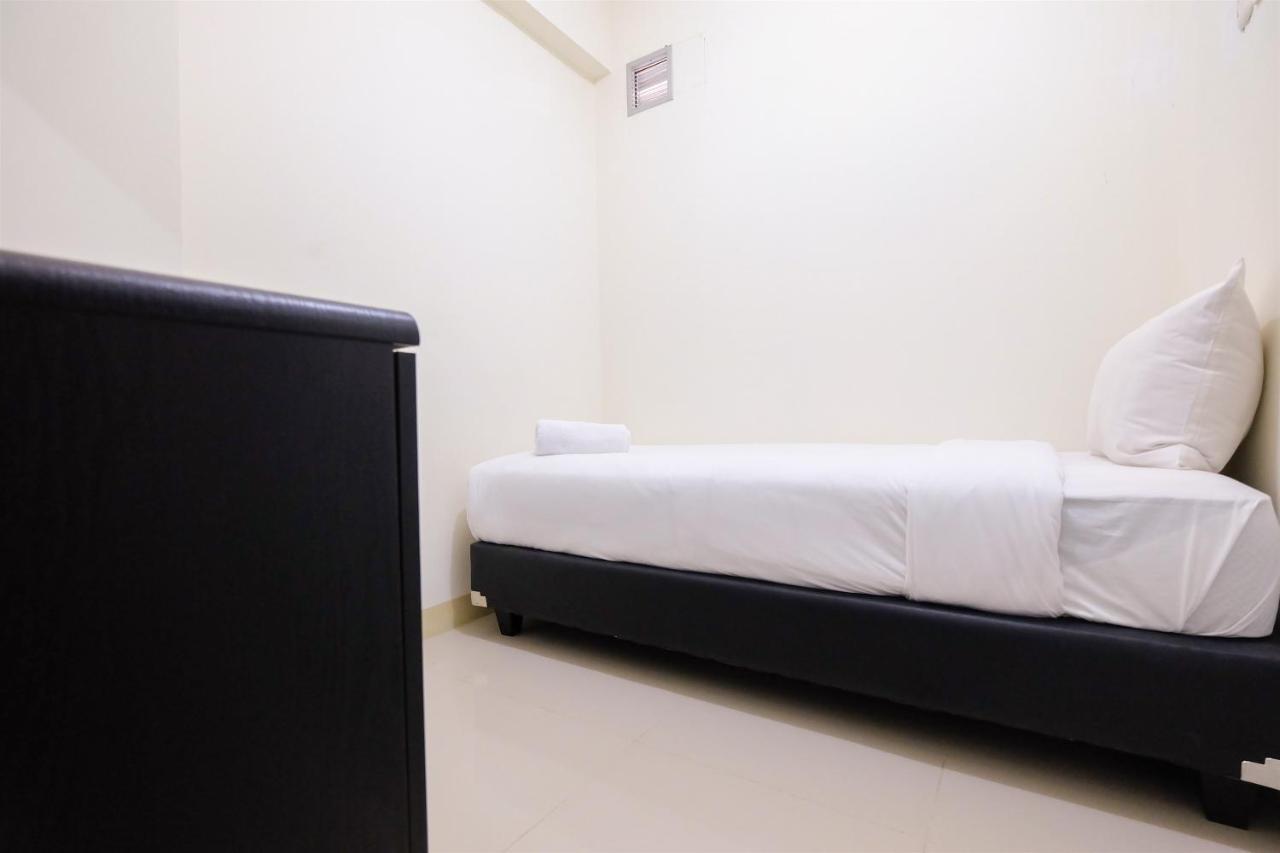 Apartment Cozy 2br At 28th Floor Pramuka By Travelio *