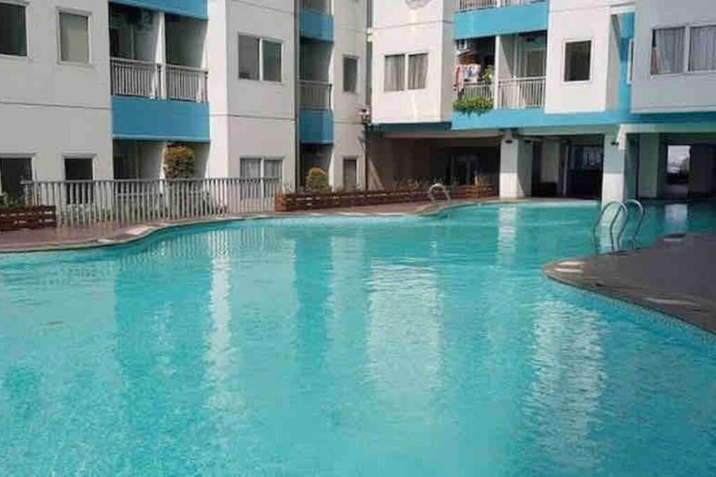 Apartment Minimalist At The Nest By Popobella Near Puri Indah West Jakarta