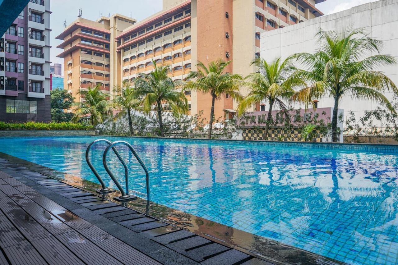 Apartment Cozy At Tamansari Semanggi By Travelio